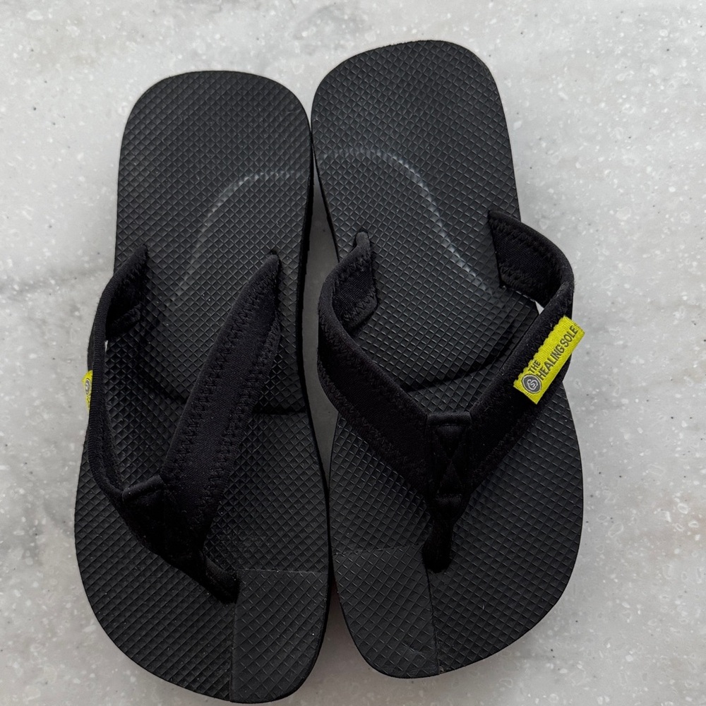 The Healing Sole Black Sandals with Yellow Tag